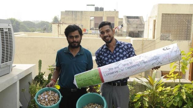 Vishal Kanet (right) and Naman Gupta saw the cigarette waste strewn around after a party at a friend’s place and got the idea for their venture.(Burhaan Kinu/HT Photo)