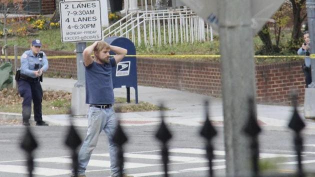 Edgar Maddison Welch, who opened fire inside a restaurant, surrenders in front of the police on Sunday in Washington. (AP photo) Edgar Maddison Welch, who opened fire inside a restaurant, surrenders in front of the police on Sunday in Washington. (AP photo)