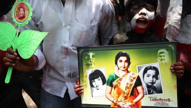 AIADMK supporters celebrate their parties victory in the 2011 state elections outside Jayalalithaa’s Poes Garden House in Chennai on May 13, 2011. (HT File photo) 