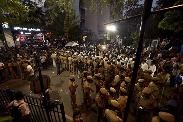 Tamil Nadu police personnel guard the main gate of the Apollo hospital, where AIADMK supremo and Tamil Nadu chief minister J Jayalalithaa suffered a cardiac arrest. (PTI)