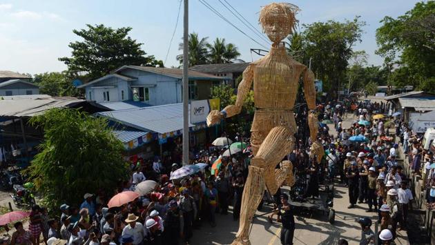 Following the parade of the giant puppets, over a hundred French and Myanmar artistes gave performances and live shows at Yangon’s key locations. (AFP)