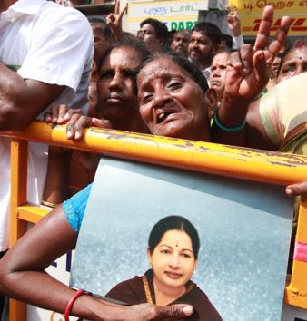 Supporters of Tamil Nadu?chief minister Jayalalithaa react outside the hospital where she is undergoing treatment after cardiac arrest on Sunday. (Srinivasulu/ HT Photo)