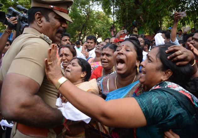 Supporters of Tamil Nadu?chief minister Jayalalithaa react outside the hospital where she is undergoing treatment after cardiac arrest on Sunday. (Srinivasulu/ HT Photo)