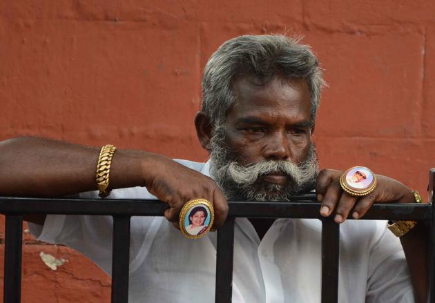 Supporters of Tamil Nadu chief minister Jayalalithaa react outside the hospital where she is being treated after false reports that she had died. (Srinivasulu/ HT Photo)