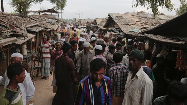 Rohingya from Myanmar make their way in an alley at an unregistered refugee camp in Teknaf, near Cox's Bazar, in Bangladesh.(AP file photo) Rohingya from Myanmar make their way in an alley at an unregistered refugee camp in Teknaf, near Cox's Bazar, in Bangladesh.(AP file photo)