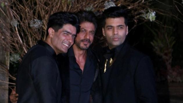 Birthday boy Manish Malhotra with filmmaker Karan Johar and actor Shah Rukh Khan. (IANS)