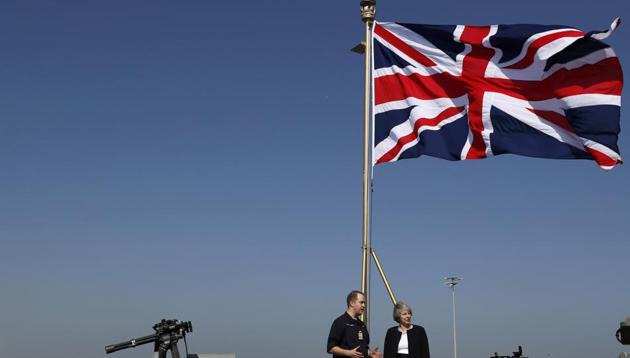 Britain's Prime Minister Theresa May visits HMS Ocean in Manama, Bahrain on December 6, 2016.(REUTERS)