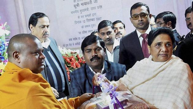 BSP supremo Mayawati presenting gifts to Buddhist monks on the occasion of Dr Bhim Rao Ambedkar’s death anniversary at Ambedkar Park in Lucknow on Tuesday. (PTI) BSP supremo Mayawati presenting gifts to Buddhist monks on the occasion of Dr Bhim Rao Ambedkar’s death anniversary at Ambedkar Park in Lucknow on Tuesday. (PTI)