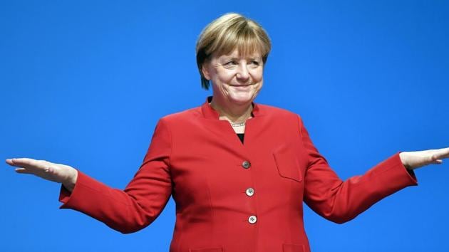 German Chancellor and Chairwomen of the CDU, Angela Merkel, gestures after her speech as part of a general party conference of the Christian Democratic Union where she has called for a burqa ban in the country. (AP Photo)