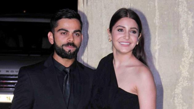 Indian cricketer Virat Kohli and actor Anushka Sharma posed for a photograph during designer Manish Malhotra's 50th birthday in Mumbai on December 5, 2016. (AFP)