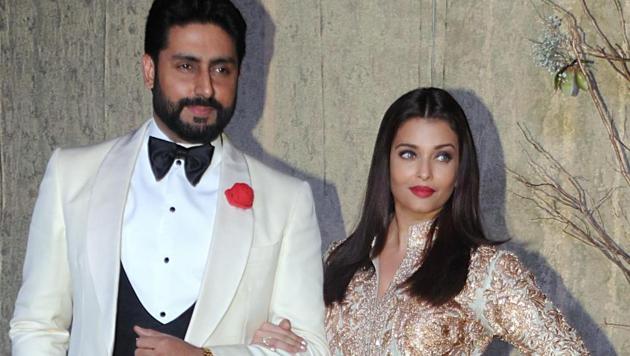Abhishek Bachchan and Aishwarya Rai Bachchan looked stunnign together in co-ordinated outfits. (AFP)