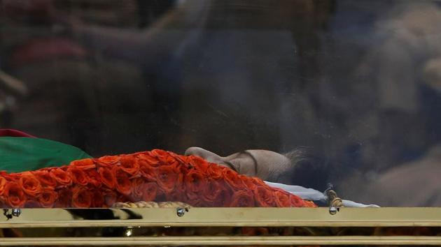 Body of ‘ revolutionary leader’ Jayalalithaa carried during her funeral procession in Chennai. (REUTERS) Body of ‘ revolutionary leader’ Jayalalithaa carried during her funeral procession in Chennai. (REUTERS)