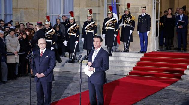 Outgoing French Prime Minister Manuel Valls (R) delivers a speech next to newly-appointed Prime Minister Bernard Cazeneuve during the official handover ceremony at the Hotel Matignon in Paris on December 6. (REUTERS) Outgoing French Prime Minister Manuel Valls (R) delivers a speech next to newly-appointed Prime Minister Bernard Cazeneuve during the official handover ceremony at the Hotel Matignon in Paris on December 6. (REUTERS)