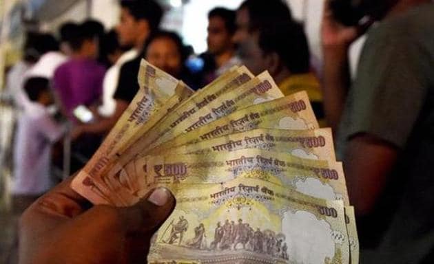 Banks may be flush with cash after demonetisation pushed people to deposit old Rs 500 and Rs 1,000 notes into bank accounts, but it has also compounded problems. Banks, already operating on wafer-thin margins, are expected to take a hit on their earnings due to low demand, delaying their ability to pass on the rate cuts widely expected in RBI’s monetary policy on Wednesday.(Reuters)
