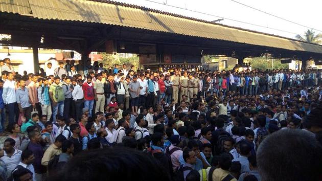 Commuters blocked tracks at the Titwala railway station on Wednesday to protest frequesnt delays of local trains.(Rishikesh Choudhary)