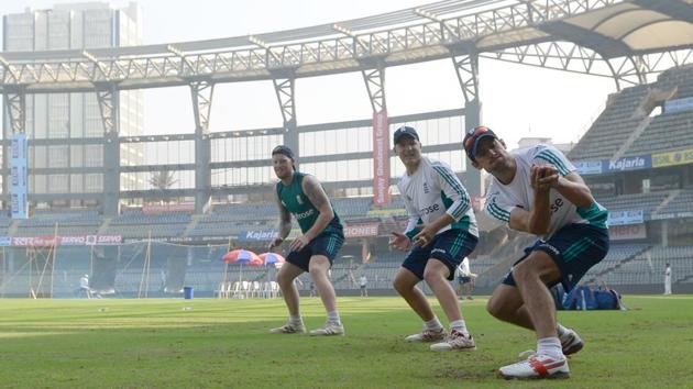 England's captain Alastair Cook (R) takes a catch during a training session at the Wankhede stadium ahead of the fourth test cricket match against India. (AFP) England's captain Alastair Cook (R) takes a catch during a training session at the Wankhede stadium ahead of the fourth test cricket match against India. (AFP)