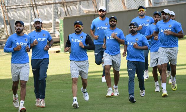 India's cricket team warm up during the training session at the Wankhede stadium ahead of the fourth test against England. (AFP) India's cricket team warm up during the training session at the Wankhede stadium ahead of the fourth test against England. (AFP)