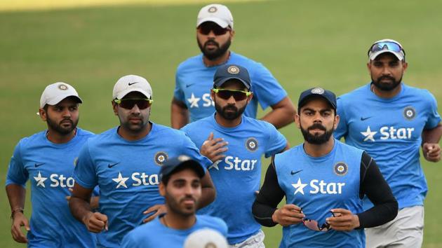 India's captain Virat Kohli (2R), Ajinkya Rahane (C), Ravichandran Ashwin (2L), Parthiv Patel (L) and Mohammed Shami (R) warm up during the training session. (AFP) India's captain Virat Kohli (2R), Ajinkya Rahane (C), Ravichandran Ashwin (2L), Parthiv Patel (L) and Mohammed Shami (R) warm up during the training session. (AFP)