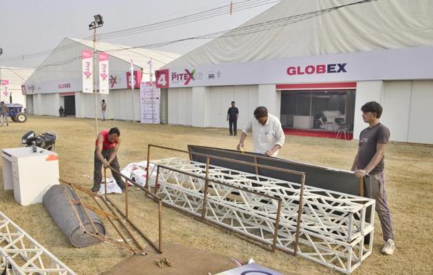 Work in progress for the Punjab International Trade Expo or PITEX that kicks off from December 8 at Ranjit Avenue, Amritsar. (Sameer Sehgal/HT)