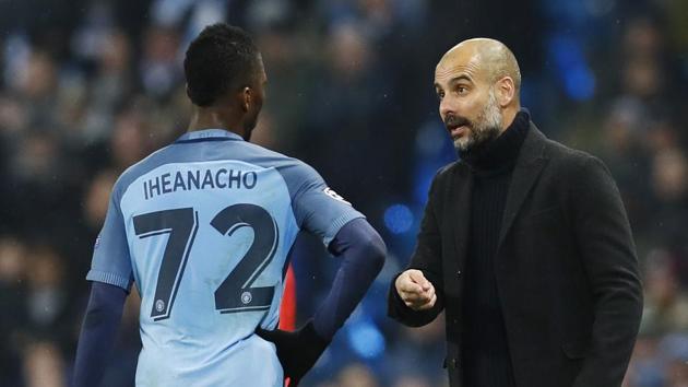 Manchester City manager Pep Guardiola instructs Kelechi Iheanacho during the Champions League match against Celtic on Tuesday.(REUTERS)