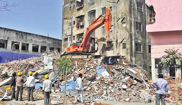 TMC demolished an illegal lodge in Kapurbawdi last Saturday. (Praful Gangurde) TMC demolished an illegal lodge in Kapurbawdi last Saturday. (Praful Gangurde)
