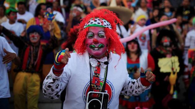 Clowns participate in a show during Salvadoran Clown Day celebrations. El Salvador celebrates National Clown Day on the second Wednesday of December. (REUTERS)
