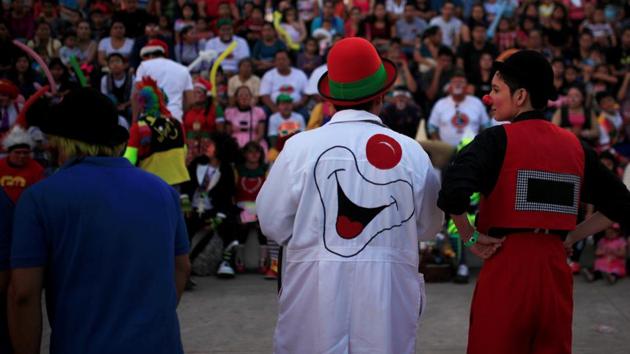 The clown day honours all Salvadorean clowns who bring fun to the nation. (REUTERS)