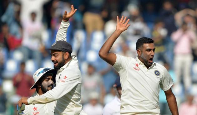 India's captain Virat Kohli (C) celebrates with Ravichandran Ashwin (R) after the dismissal of England's Keaton Jennings. (AFP) India's captain Virat Kohli (C) celebrates with Ravichandran Ashwin (R) after the dismissal of England's Keaton Jennings. (AFP)