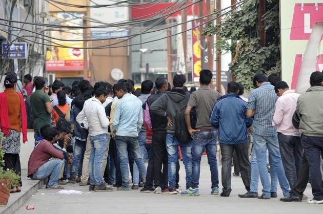 People stand in a long queues outside an ATM in Noida. (Sunil Ghosh/HT File Photo) People stand in a long queues outside an ATM in Noida. (Sunil Ghosh/HT File Photo)