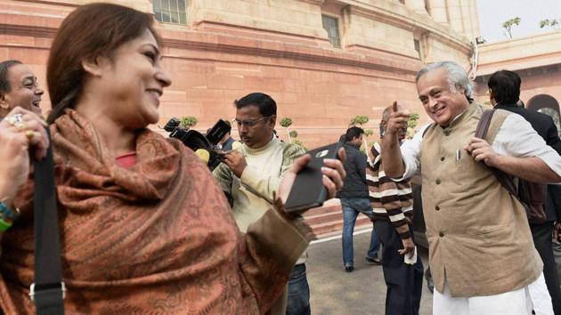 Rajya Sabha members Jairam Ramesh (R) and Rupa Ganguly during the Winter Session at Parliament House in New Delhi on Thursday.(PTI photo)