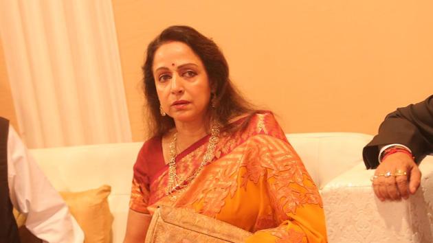 Bollywood actor turned politician Hema Malini, a BJP MP from Mathura, was also present at the ‘dreamy’ wedding reception. (Manoj Verma/HT Photo) 