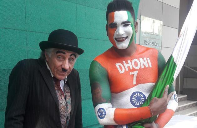 It is all balmy at the Wankhede as a member of the Barmy Army, England cricket team’s fan club, dressed as Charlie Chaplin’s iconic tramp character poses with a supporter of India’s limited-overs skipper Mahendra Singh Dhoni. (HT Photo) It is all balmy at the Wankhede as a member of the Barmy Army, England cricket team’s fan club, dressed as Charlie Chaplin’s iconic tramp character poses with a supporter of India’s limited-overs skipper Mahendra Singh Dhoni. (HT Photo)