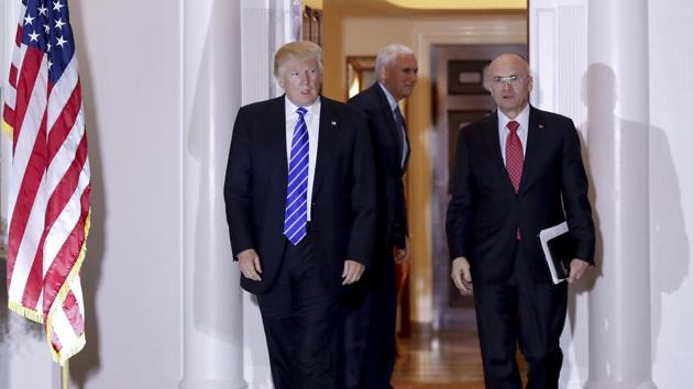 President-elect Donald Trump walks with Andy Puzder at Trump National Golf Club in Bedminster, New Jersey, on November 19. (AP FILE) President-elect Donald Trump walks with Andy Puzder at Trump National Golf Club in Bedminster, New Jersey, on November 19. (AP FILE)
