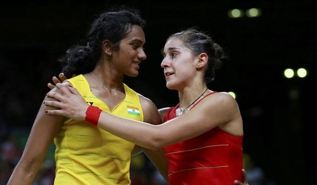Carolina Marin (ESP) of Spain talks with P.V. Sindhu (IND) of India after winning their match at Rio 2016 Olympics.(REUTERS)