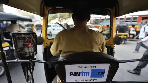 On a new path: The autorickshaw driver is on his way to becoming hi-tech. (ARIJIT SEN/HT PHOTO)