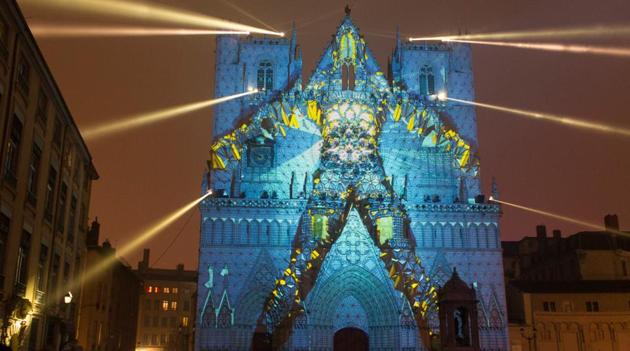 An installation called View of Evolutions by artist Yann Nguema is seen on the Saint-Jean Cathedral during the rehearsal for the Festival of Lights (Fetes des Lumieres) in Central Lyon, France on December 7, 2016. (REUTERS)
