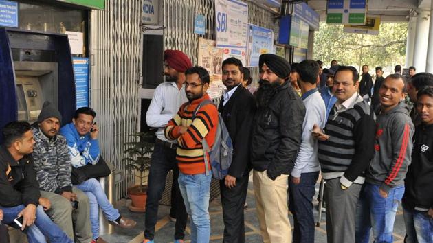 People waiting in a queue in front of a closed ATM in Sector 17, Chandigarh, on Thursday. (Keshav Singh/HT Photo) People waiting in a queue in front of a closed ATM in Sector 17, Chandigarh, on Thursday. (Keshav Singh/HT Photo)