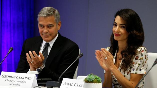 Actor George Clooney and his wife Amal attend a CEO roundtable at the United Nations during the United Nations General Assembly in New York. (REUTERS) Actor George Clooney and his wife Amal attend a CEO roundtable at the United Nations during the United Nations General Assembly in New York. (REUTERS)