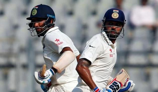 India's Murali Vijay (R) and Cheteshwar Pujara run between wickets during the fourth Test against England.(REUTERS)