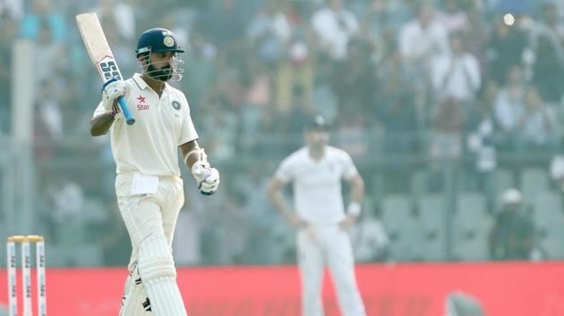 Mural Vijay raises his bat on reaching fifty during day 2 of the fourth test match. (BCCI/ SPORTZPICS) 