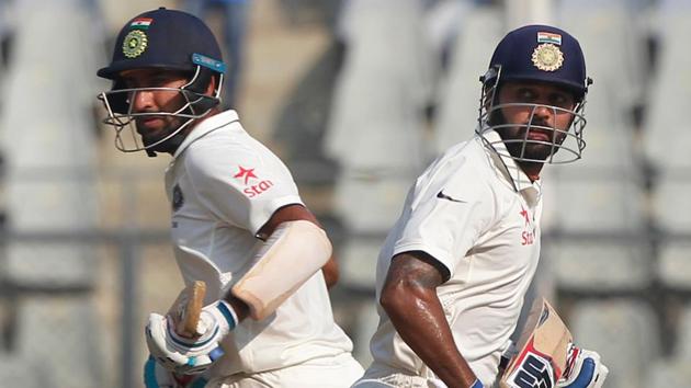 Murali Vijay and Cheteshwar Pujara shared a 100-run partnership to boost India on the second day of the Wankhede Test versus England.(BCCI)