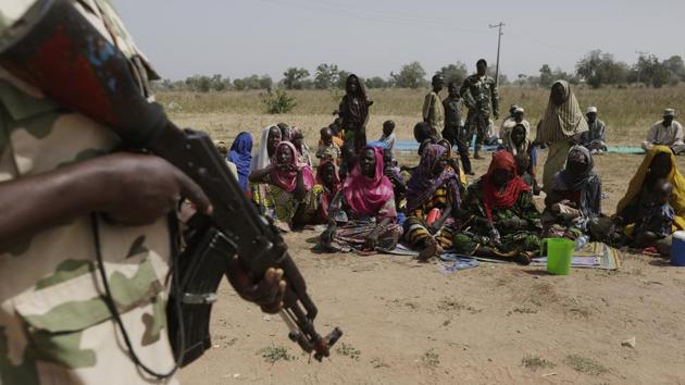 File photo of soldiers guarding people fleeing from Boko Haram’s carnage in Nigeria. (AP) File photo of soldiers guarding people fleeing from Boko Haram’s carnage in Nigeria. (AP)