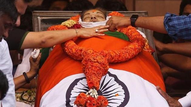 People pay homage to the body of Tamil Nadu Chief Minister Jayalalithaa Jayaraman, who died on Monday, in Chennai, India December 6, 2016. (Reuters) People pay homage to the body of Tamil Nadu Chief Minister Jayalalithaa Jayaraman, who died on Monday, in Chennai, India December 6, 2016. (Reuters)