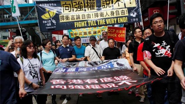 There are increasing fears that China is tightening its grip on the semi-autonomous city of Hong Kong. People took out march against China. (Agency Representational Photo) There are increasing fears that China is tightening its grip on the semi-autonomous city of Hong Kong. People took out march against China. (Agency Representational Photo)