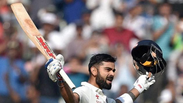 ndia captain Virat Kohli celebrates his century on the third day of the fourth Test against England at the Wankhede stadium in Mumbai on Saturday. (PTI) ndia captain Virat Kohli celebrates his century on the third day of the fourth Test against England at the Wankhede stadium in Mumbai on Saturday. (PTI)