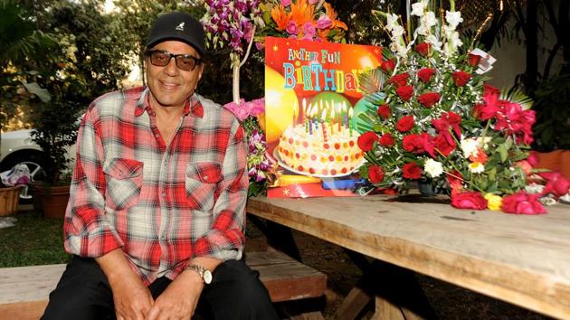 Dharmendra poses for a photograph during an event to mark his 81st birthday at his home in Mumbai. (AFP)