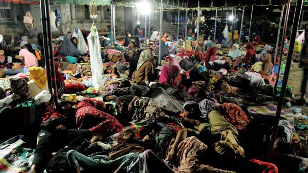 Indonesian women and children displaced by an earthquake rest under a tent in Pidie Jaya, Aceh province, on December 9, 2016. The shallow 6.5-magnitude quake levelled hundreds of homes, mosques and businesses across Aceh province, one of the areas worst affected by the destructive 2004 tsunami. (AFP) Indonesian women and children displaced by an earthquake rest under a tent in Pidie Jaya, Aceh province, on December 9, 2016. The shallow 6.5-magnitude quake levelled hundreds of homes, mosques and businesses across Aceh province, one of the areas worst affected by the destructive 2004 tsunami. (AFP)
