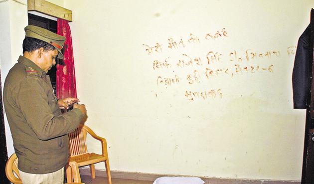 Kamal Singh Chauhan left three suicide notes — on a piece of paper, scribbled on a bed sheet with pen, and on the wall using tomato ketchup. Kamal Singh Chauhan left three suicide notes — on a piece of paper, scribbled on a bed sheet with pen, and on the wall using tomato ketchup.