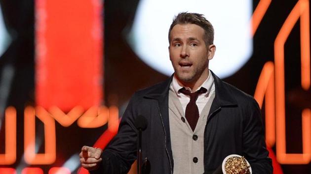 Ryan Reynolds said he was not grumpy in Taylor Swift’s Fourth of July photo. (Kevork Djansezian/Invision/AP) Ryan Reynolds said he was not grumpy in Taylor Swift’s Fourth of July photo. (Kevork Djansezian/Invision/AP)
