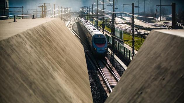 A passenger train enters the south portal of the Gotthard rail tunnel between Erstfeld and Pollegio, in Pollegio, Switzerland, on Sunday. (AP) A passenger train enters the south portal of the Gotthard rail tunnel between Erstfeld and Pollegio, in Pollegio, Switzerland, on Sunday. (AP)